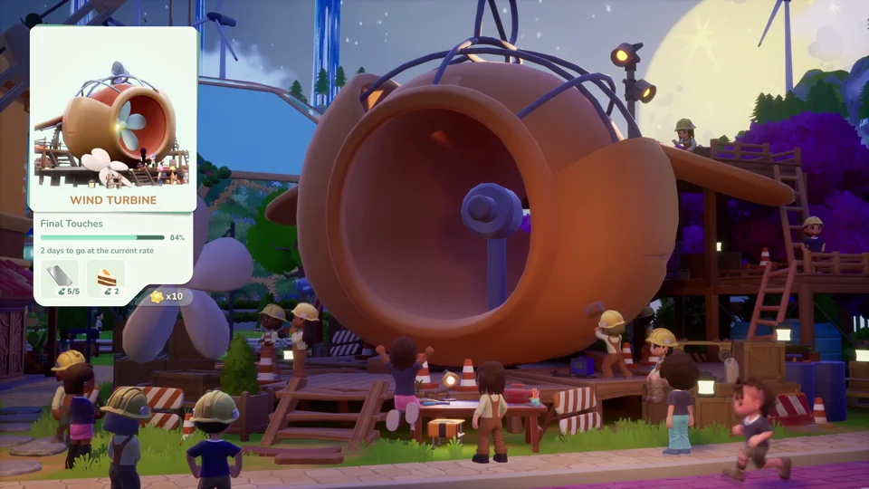 Players building a large wind turbine